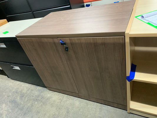 Pre-Owned 2 shelf walnut storage cabinet with doors